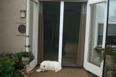TALL WHITE FRENCH ROLL-AWAY SCREEN DOORS FOR OUTSWINGING DOORS WITH BLINDS